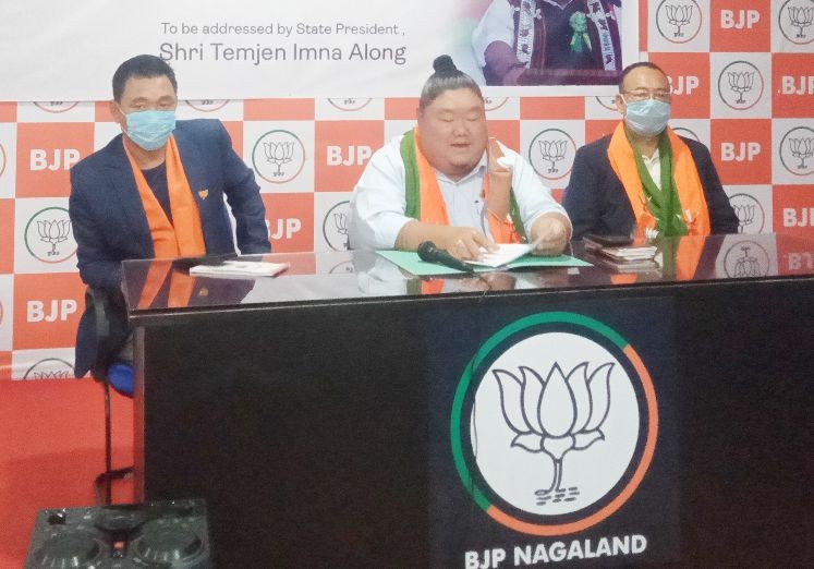 Nagaland state BJP president Temjen Imna Along (c) addressing the press conference in Kohima on July 2. (Morung Photo)